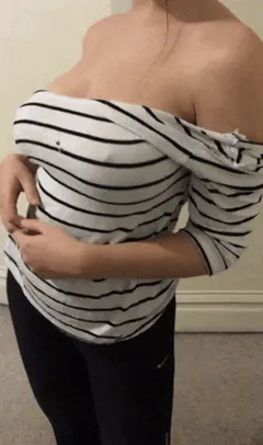 a sexy way to strip down her top