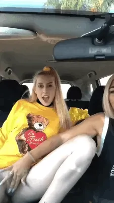 blonde babe in driver seat masturbating blonde pant less babe in passenger seat in public