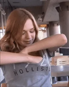 cute redhead reveals her nice tits