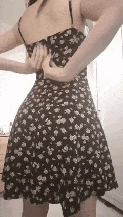 slowly removing dress revealing perfect body