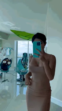 Alythuh nudes the dress highlights her figure