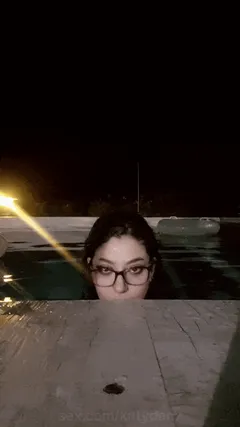 babe shows off huge tits in the pool