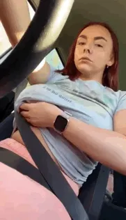 redhead dropping her tits in public while driving